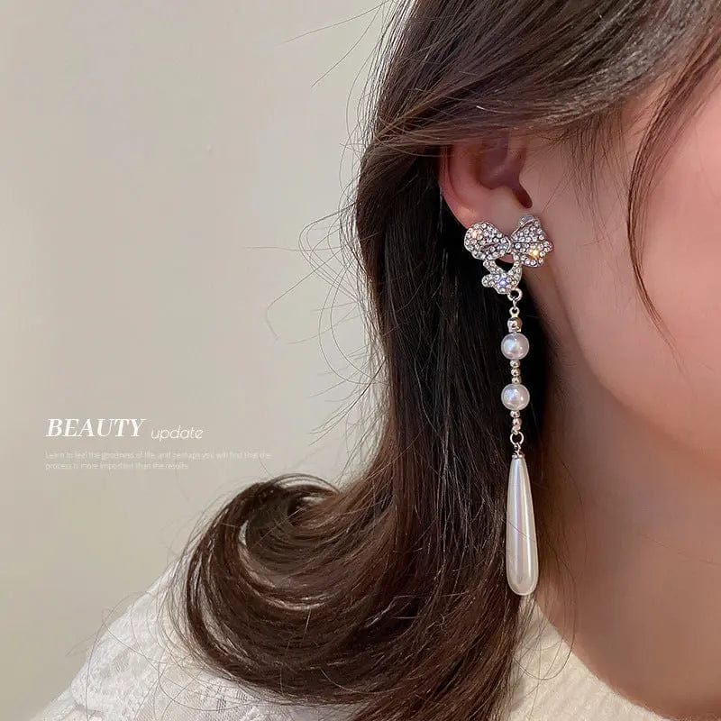 HE7953 / silver Fashion Temperament Silver Needle Pearl with Diamond Bow Earrings 2022 New Women's Jewelry