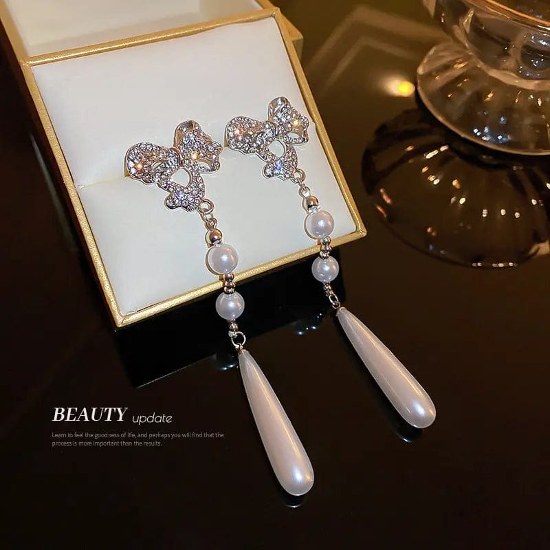 HE7953 / silver Fashion Temperament Silver Needle Pearl with Diamond Bow Earrings 2022 New Women's Jewelry