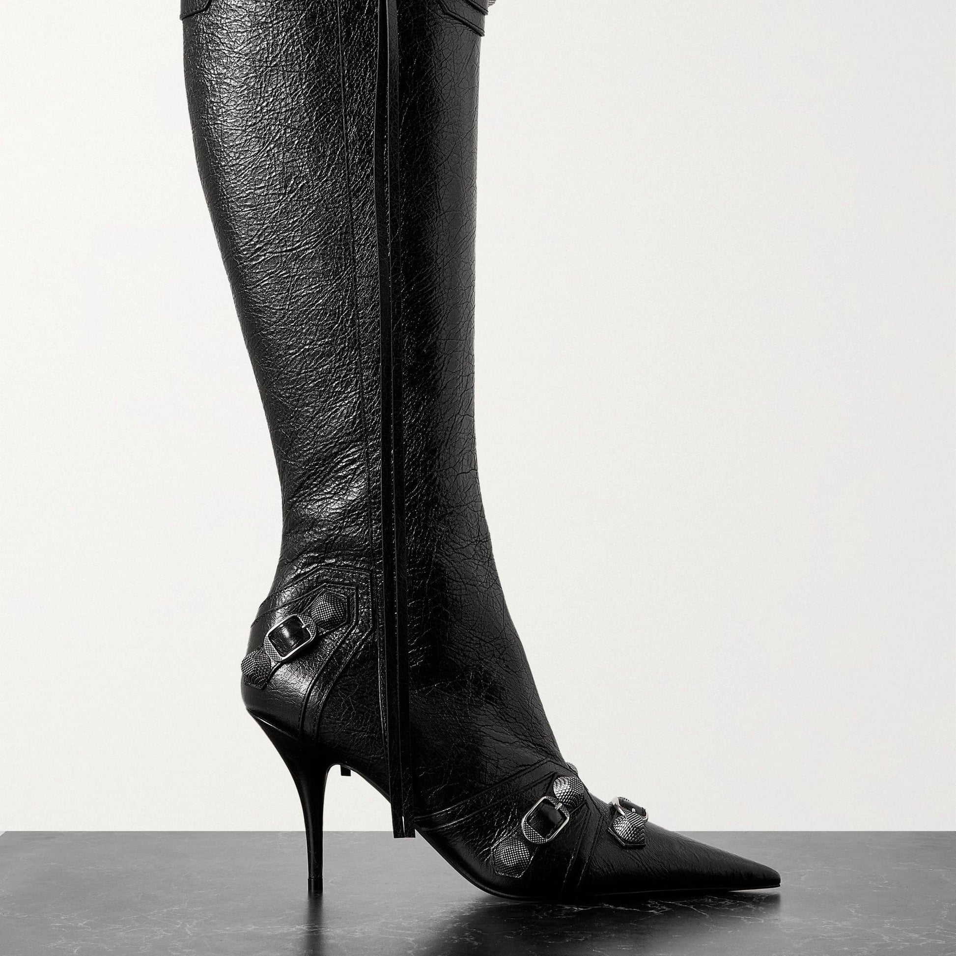 TX hardware crafted glossy sleek point-toe shape poised slim stiletto heels glamour embellished textured-leather knee boots